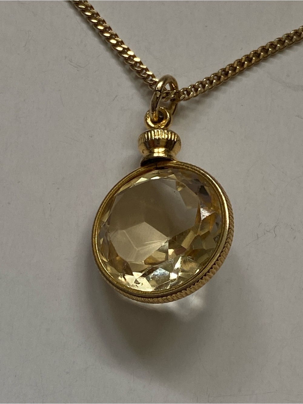 Gold Tone Metal Pendant Necklace with Faceted Champagne Stone